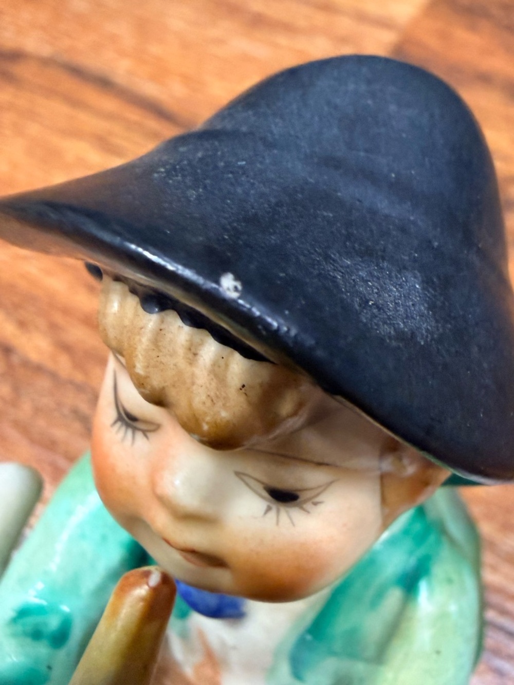 Figurine of Boy Playing Horn - Picture 9 of 15